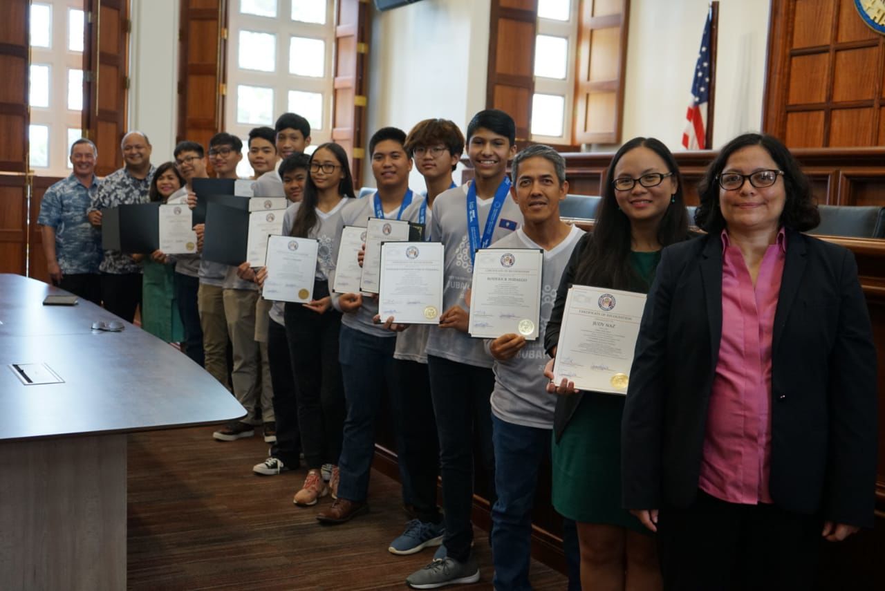 Math teacher, robotics team recognized for excellence